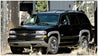 Bushwacker 00-06 Chevy Tahoe OE Style Flares 4pc 4-Door - Black Bushwacker