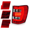 ANZO 1999-2004 Jeep Grand Cherokee LED Tail Lights w/ Light Bar Chrome Housing Red/Clear Lens ANZO