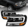 ANZO 99-04 Jeep Grand Cherokee Crystal Headlights - w/ Light Bar Black Housing ANZO